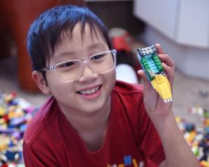 Arthur Yonatan, 9, of Dunedin, builds boats and cars with Lego bricks at the NZ International...