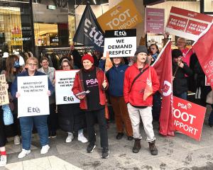 Care and support workers rally outside Dunedin’s Meridian Mall yesterday as part of a pay equity...