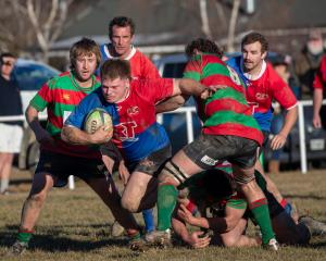 Maniototo hooker Jack Clement charges at the Matakanui Combined defence in Omakau last weekend....