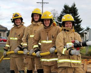 Waitahuna’s firefighting Holgates, (from left) dad Quentin and siblings Crede, 20, Bryn, 19, and...