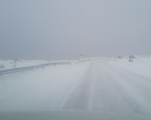 Chains are still needed if driving the Crown Range Road  after heavy snow yesterday. Photo:...