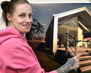 Able Abodes managing director Cyndee Elder with an image featuring housing units she has...