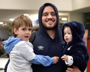 New Zealand-born England rugby player Ethan Roots — with his sons Noah, 3, and Benji, 11 months —...