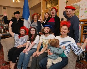 Watching the Paris Olympic Games are members of the Alliance Francaise Dunedin branch (front row,...