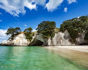 Cathedral Cove can attract up to 300,000 visitors per year. Photo: Getty Images  