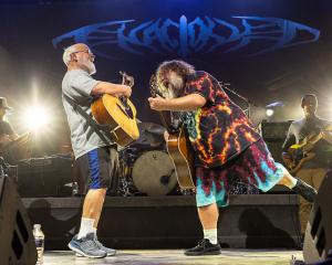 Kyle Gass (L) and Jack Black perform as Tenacious D. Photo: Getty