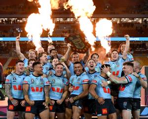 NSW celebrate their State of Origin win in Brisbane. Photo: Getty Images