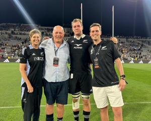 Katrina, Hunter and Tom Darry with Sam after his All Blacks debut in San Diego. Photo: Supplied