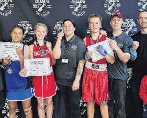 Bo-Dean Blackburn (centre) with some of her young up-and-coming boxers. PHOTO: SUPPLIED