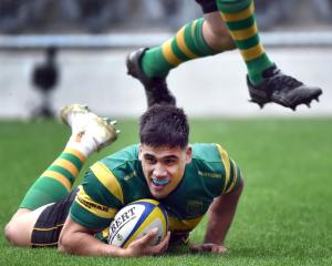 Green Island centre Levi Harmon dives over for a try. PHOTOS: PETER MCINTOSH