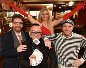 Magicians preparing to take to the Regent Theatre stage this afternoon are (from left) Reggie...