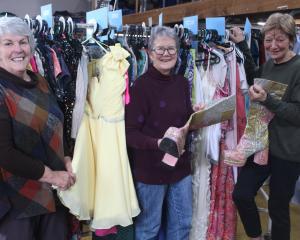 Sorting out costumes for the Invercargill Musical Theatre production of Mamma Mia are (from left)...
