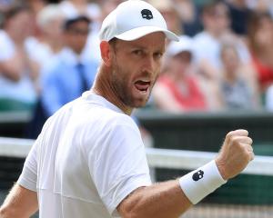 Michael Venus is having success in the mixed and men's doubles at Wimbledon. Photo: Getty Images 