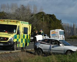 Emergency services attend a crash at the intersection of State Highway 1 and Limeworks Rd in...