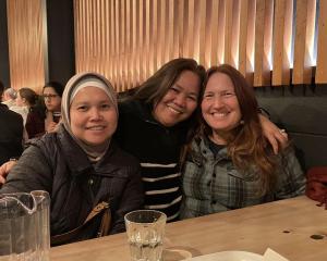 Hendriani Trisaptayuni (left) with Socorro Laraga (centre) and Maddy Maxwell. PHOTO: SUPPLIED
