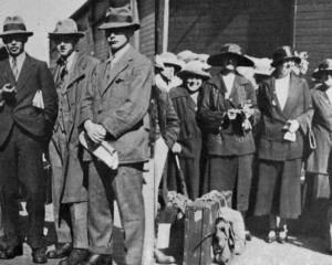 British ex-public school boys (left) and young Scotswomen, latest immigrants to New Zealand. —...