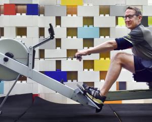 Unipol manager Dan Porter uses a rowing machine in the new low-stimulus area of the student...