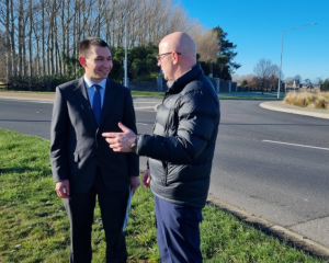 Transport Minister Simeon Brown (left) and Waimakariri MP Matt Doocey at the Pegasus roundabout...