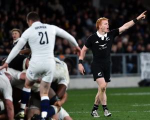 Halfback Finlay Christie takes charge during the first test against England in Dunedin last...