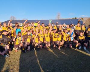 Upper Clutha celebrate victory in Wanaka on Saturday. PHOTO: MARJORIE COOK