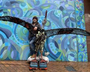 Dunedin artist Veece Allisonis pictured with "Albert" the albatross sculpture he has built at the...