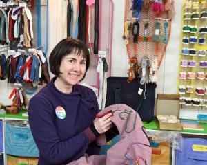 Stitch Kitchen manager Fiona Jenkin works on a Toni Darling jacket she found in an op-shop. PHOTO...