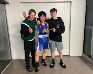 Celebrating their victories at the Canterbury Boxing Association tournament are (from left)...