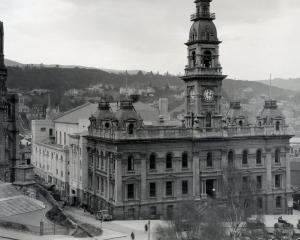 A Dunedin City Council archival photo of the Dunedin Municipal Chambers and the town hall (at...