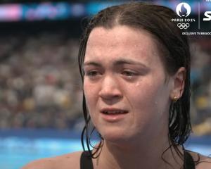 Dunedin swimmer Erika Fairweather wells up after placing fourth in the women’s freestyle 400m...
