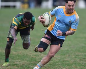 Varsity tears through the GI defence during last Saturday's bout. PHOTO: ODT FILES