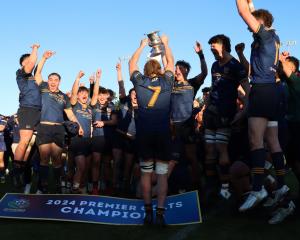 The Dunedin premier colts team celebrate their sixth consecutive title. PHOTO: WWW.CASWELLIMAGES.COM