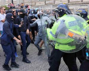 Far-right anti-immigration protesters clash with police in Liverpool. Photo: Reuters 