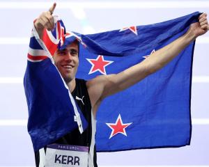 Hamish Kerr celebrates his high jump victory in Paris. Photo: Reuters