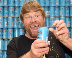 Emerson’s Brewery founder Richard Emerson cracks open a can of his Pilsner. PHOTO: STEPHEN JAQUIERY