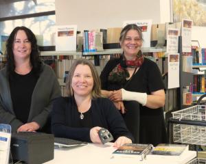 Library staff, including (from left) Kelly Campbell, Jaimie Phipps and Mo Fenton, have settled...