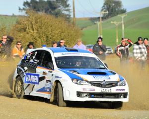 Invercargill driver Mark McMillan guides his Impreza to victory in the Wyndham Rally on Saturday....