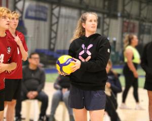 Danielle Frost talks volleyball with some students at Logan Park. PHOTOS: SUPPLIED