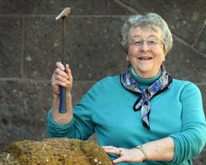 University of Otago geology emeritus professor Daphne Lee with a rock rich in fossils, from...