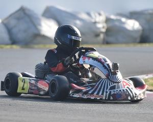 Wānaka kart racer George Tucker takes a corner at the Kartsport Dunedin August Open Day on Sunday...