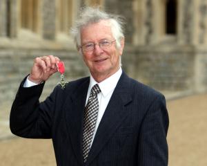 Frank Duckworth poses after he was made a Member of the British Empire (MBE) in 2010. Photo:...