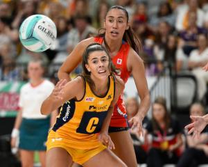 Dakota Thomas (rear) in action for the Swifts against the Lightning on the Gold Coast last year....