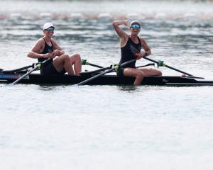Brooke Francis (left) and Lucy Spoors celebrate winning gold in the women’s double sculls final...