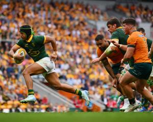 Kurt-Lee Arendse of the Springboks runs with the ball during the Rugby Championship match against...