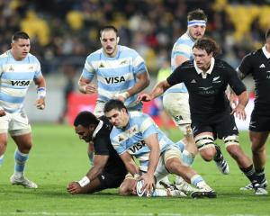 Pablo Matera of Argentina and Sevu Reece of New Zealand compete for the ball during the test...