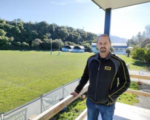 Richard Cotter enjoys the view from the balcony of the new Takahanga Sport and Recreation...