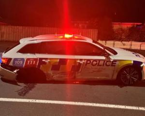 The police car was damaged in the crash involving suspected drunk driver. Photo: supplied/New...