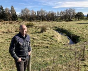 Pomahaka Water Care Group co-ordinator Craig Simpson wants to transform this paddock on the edge...