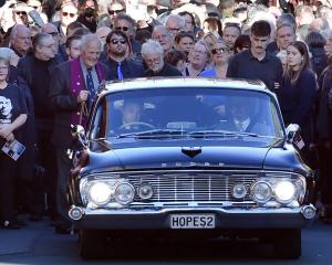 Family and friends mourn The Chills’ lead singer Martin Phillipps after his funeral service at...