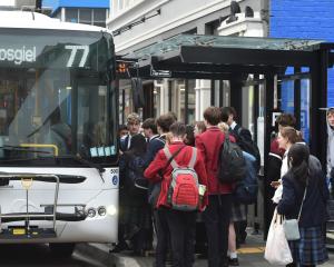 School students queuing to board the Mosgiel 77 bus on yesterday. PHOTO: GREGOR RICHARDSON