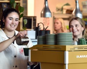 The Perc Plaza staff Didi Tamang (left) and Anna McIntyre, both 21, brew a coffee on The Perc...